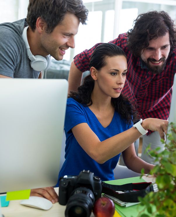 Designers reviewing a website together